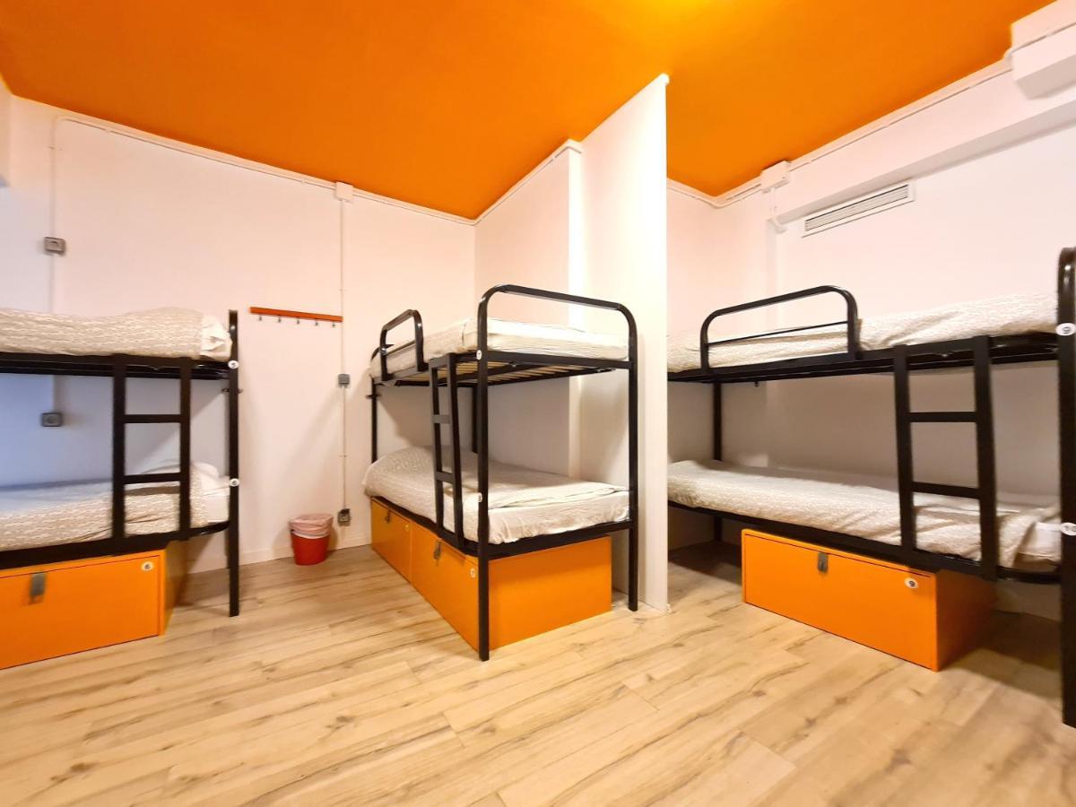 Cama individual en habitación compartida mixta